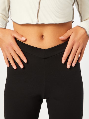 ABOUT YOU Limited Flared Leggings 'Milly' in Black