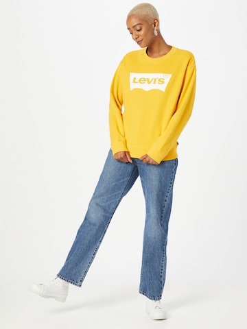 LEVI'S ® Collegepaita 'Graphic Standard Crew' värissä keltainen