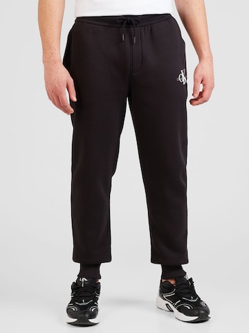 Calvin Klein Jeans Дънки Tapered Leg Панталон в черно: отпред