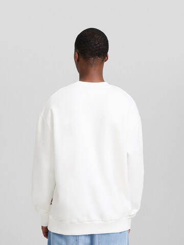 Sweat-shirt Bershka en blanc