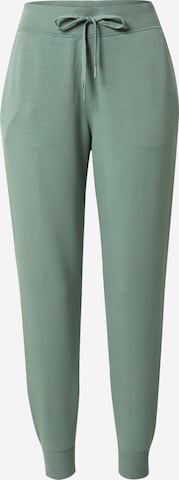 Pantalon de sport SKECHERS en vert : devant