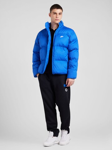 Nike SportswearZimska jakna 'CLUB' - plava boja