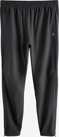 Next Tapered Urheiluhousut värissä musta: etupuoli