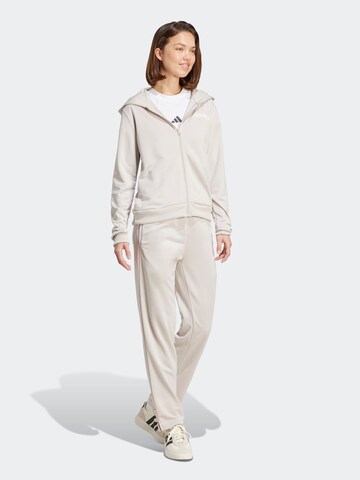 ADIDAS SPORTSWEAR Тренировочный костюм 'Essentials' в Бежевый: спереди