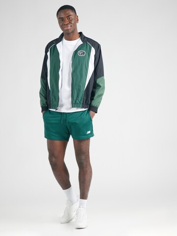 Regular Pantaloni 'Essentials' de la new balance pe verde