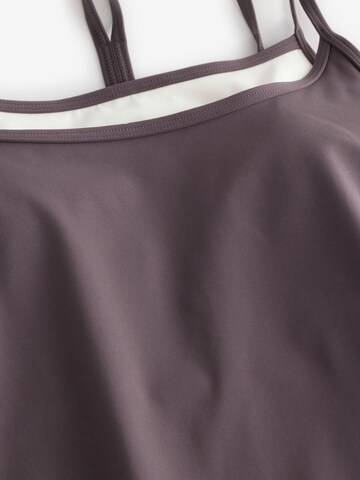 Top di Osia in marrone