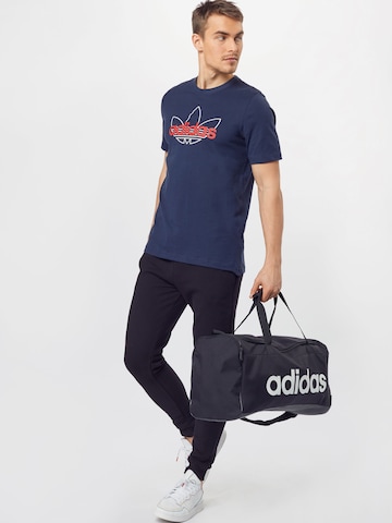 ADIDAS ORIGINALS Skinny Koszulka w kolorze niebieski