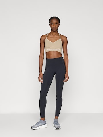 Skinny Pantalon de sport 'Elite' UNDER ARMOUR en noir