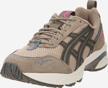 Baskets basses ASICS SportStyle en gris : devant