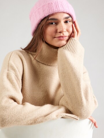 Pullover di Monki in beige