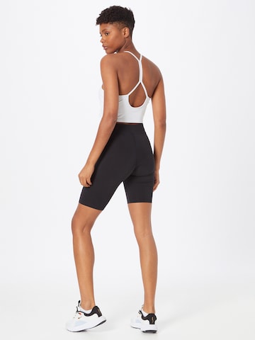 Skinny Leggings 'Essential' de la Nike Sportswear pe negru
