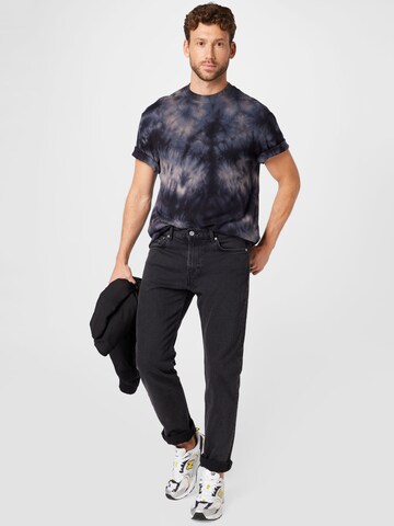 juoda WEEKDAY Standartinis Džinsai 'Easy Poppy'