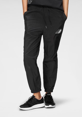 ADIDAS SPORTSWEAR Tapered Sports trousers in Black: front