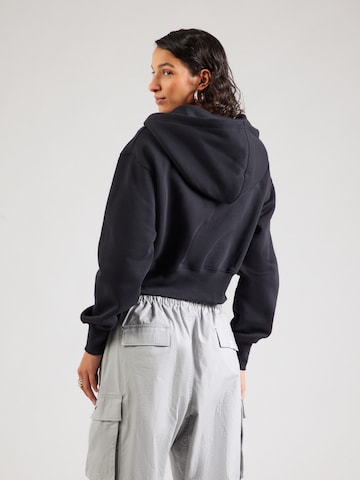 Nike Sportswear Collegetakki 'PHNX FLC' värissä musta