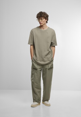 Urban Classics Свободный крой Брюки-карго в Зеленый