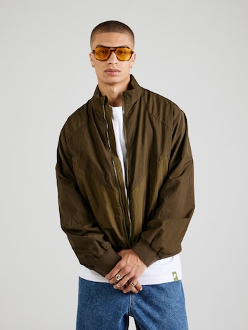 Nike Sportswear Přechodná bunda – zelená: přední strana