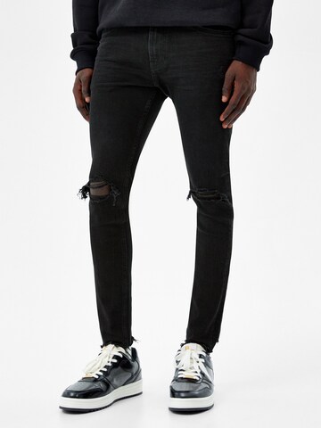 Bershka Slim fit Jeans in Black: front