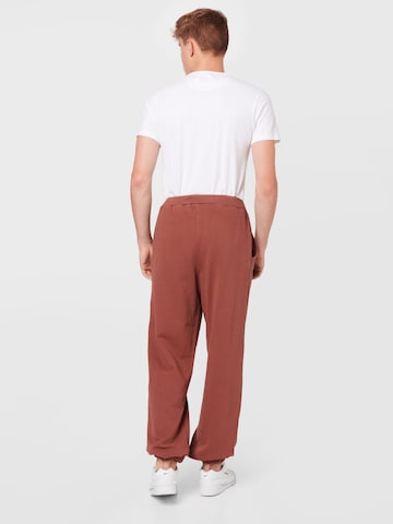 ABOUT YOU Limited Loose fit Pants 'Luis' in Brown