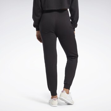 Reebok Tapered Sports trousers in Black