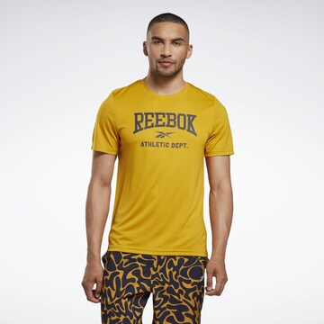 Reebok - Camisa funcionais em amarelo: frente