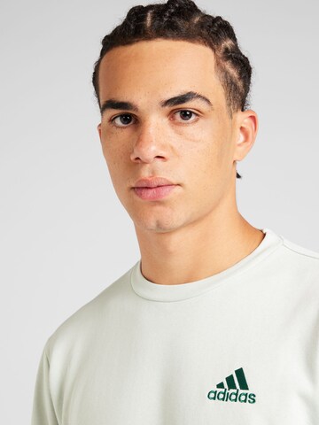 ADIDAS SPORTSWEAR Sports sweatshirt 'FEELCOZY' in Green