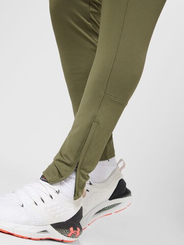 UNDER ARMOUR Slim fit Workout Pants 'Challenger' in Green