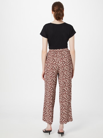 ABOUT YOU Loose fit Trousers 'Mina' in Red