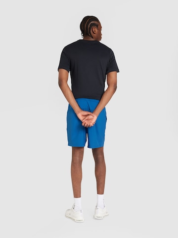 NIKE Regularen Športne hlače | modra barva
