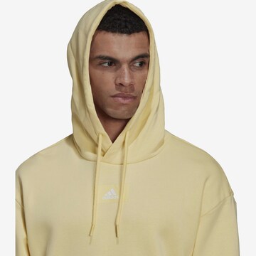 ADIDAS SPORTSWEAR Athletic Sweatshirt 'Essentials Feelvivid  Fleece Drop Shoulder' in Yellow
