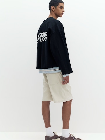 Loosefit Pantalon Pull&Bear en blanc