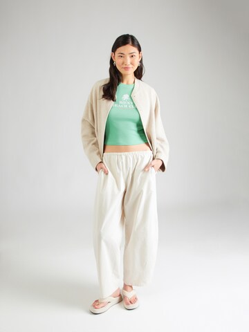 ROXY T-shirt 'BEACH LOVE' i grön