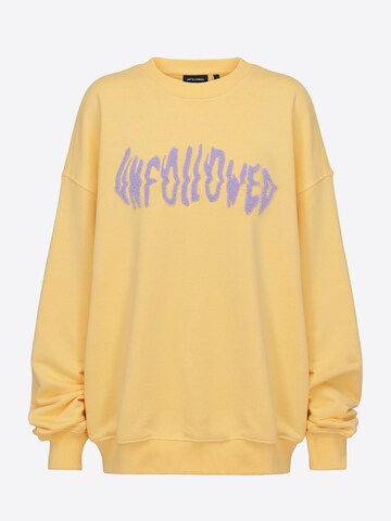 Sweat-shirt 'Vibe' UNFOLLOWED x ABOUT YOU en jaune : devant