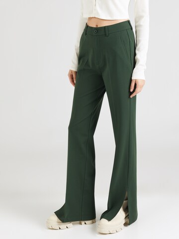 Evazați Pantaloni cu dungă 'Tela' de la florence by mills exclusive for ABOUT YOU pe verde: față