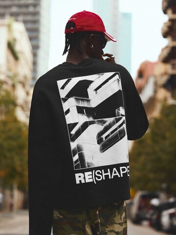 Sweat-shirt Bershka en noir : devant