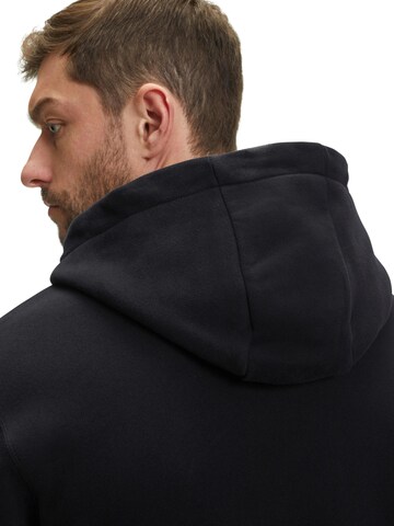 FALKE Sweatshirt 'Sweat'‌‌‌‌‌ in Schwarz