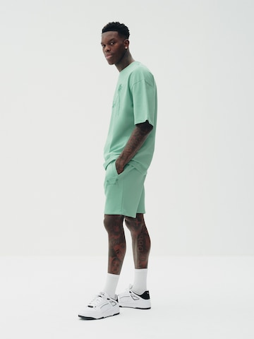 Sinned x ABOUT YOU Loose fit Trousers 'Finn' in Green