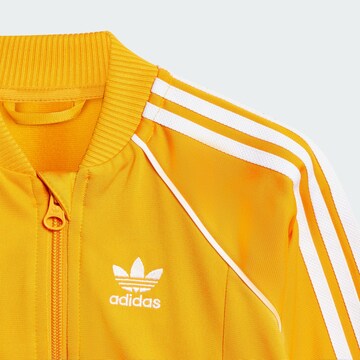 Tuta da jogging 'Adicolor' di ADIDAS ORIGINALS in giallo
