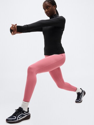 NIKESkinny Sportske hlače 'TEMPO' - roza boja