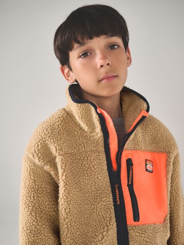 Superdry - Chaqueta polar en beige