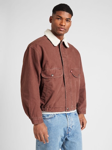 LEVI'S ® - Chaqueta de entretiempo 'Rancher Sherpa Trucker' en marrón: frente