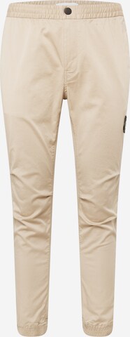 Effilé Pantalon chino Calvin Klein Jeans en beige : devant