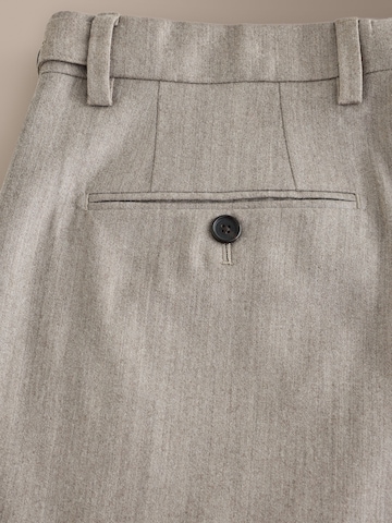 Slimfit Pantaloni con piega frontale 'Signature' di Next in beige