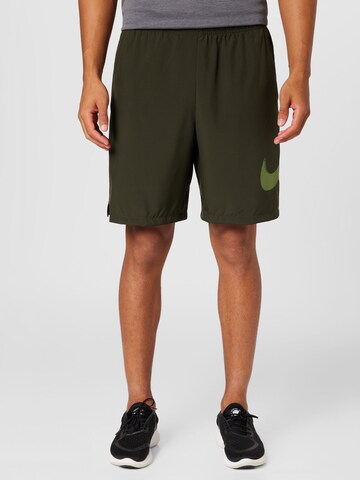 NIKE - Loosefit Pantalón deportivo en verde: frente