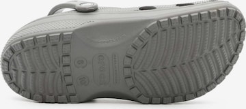 Clogs di Crocs in grigio