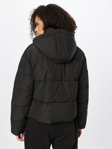 ABOUT YOU x INNA Zimska jakna 'Malin' | črna barva