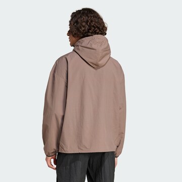 ADIDAS SPORTSWEAR Μπουφάν πεζοπορίας 'City Escape' σε καφέ
