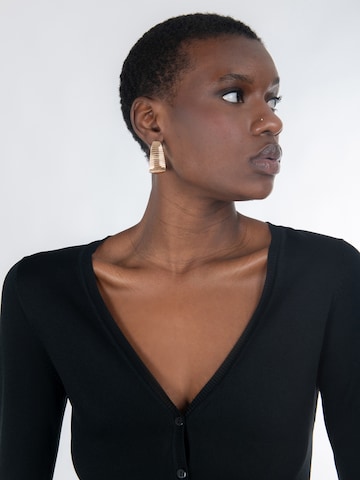 Influencer Плетена жилетка в черно