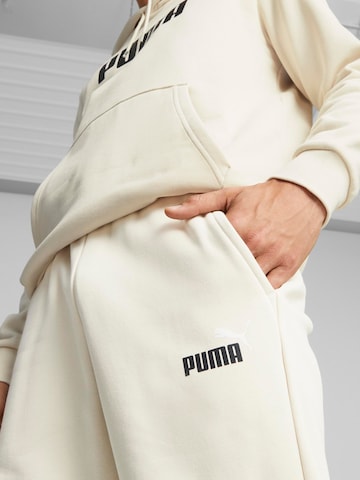 Tapered Pantaloni sport 'ESS+' de la PUMA pe alb
