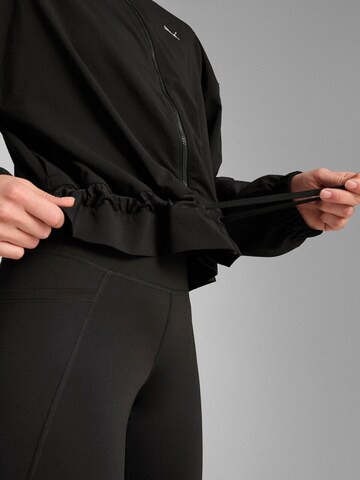 PUMA Sportjacke‌‌‌‌ in Schwarz