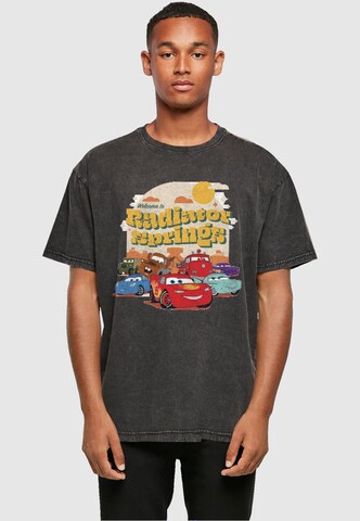 ABSOLUTE CULT Shirt 'Cars - Radiator Springs Group' in Zwart: voorkant